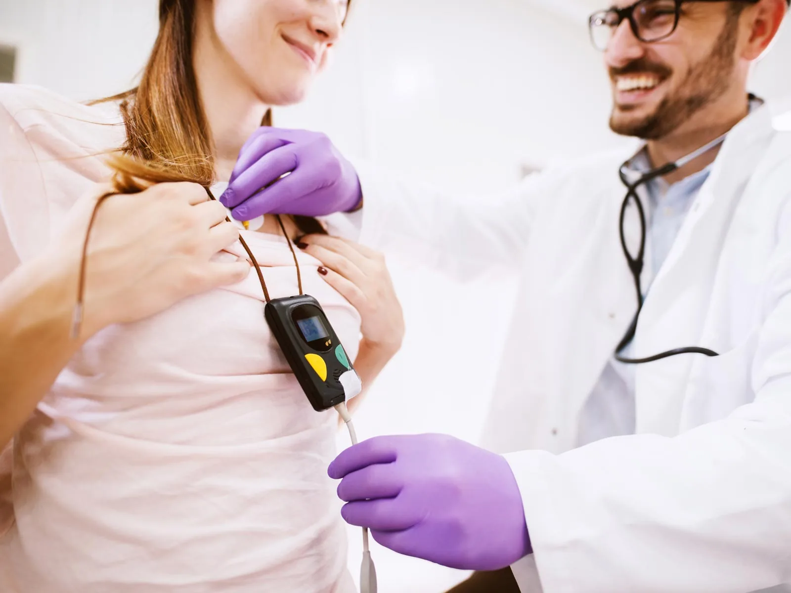 Woman wearing a Holter recorder